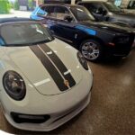 Michael applying ceramic sealant to vehicle paint during mobile detailing in San Diego