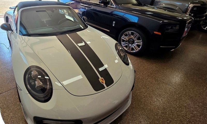 Michael applying ceramic sealant to vehicle paint during mobile detailing in San Diego