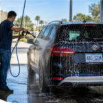 Vehicle going through a touchless automatic car wash CA